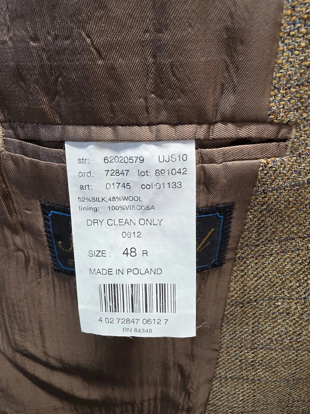 52%silk 48%wool classic brown sport coat featuring a windowpane plaid pattern